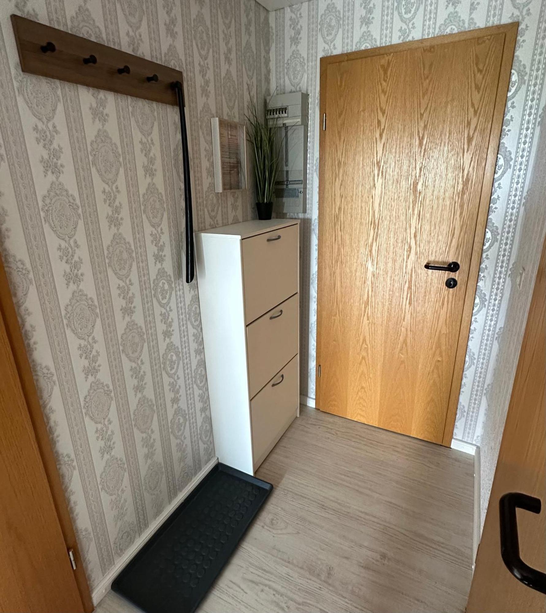 Rosenhaus Esens - Wohnung Backbord ภายนอก รูปภาพ