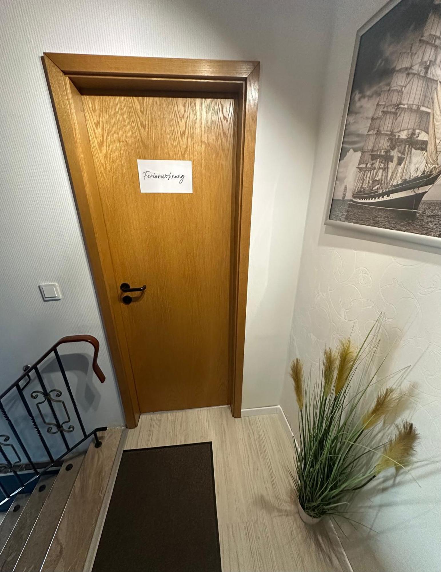Rosenhaus Esens - Wohnung Backbord ภายนอก รูปภาพ